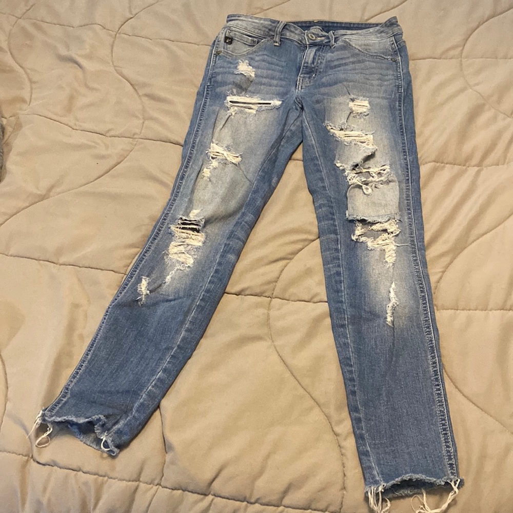 KanCan denim. Ultra skinny and ultra distressed! Very stretchy.